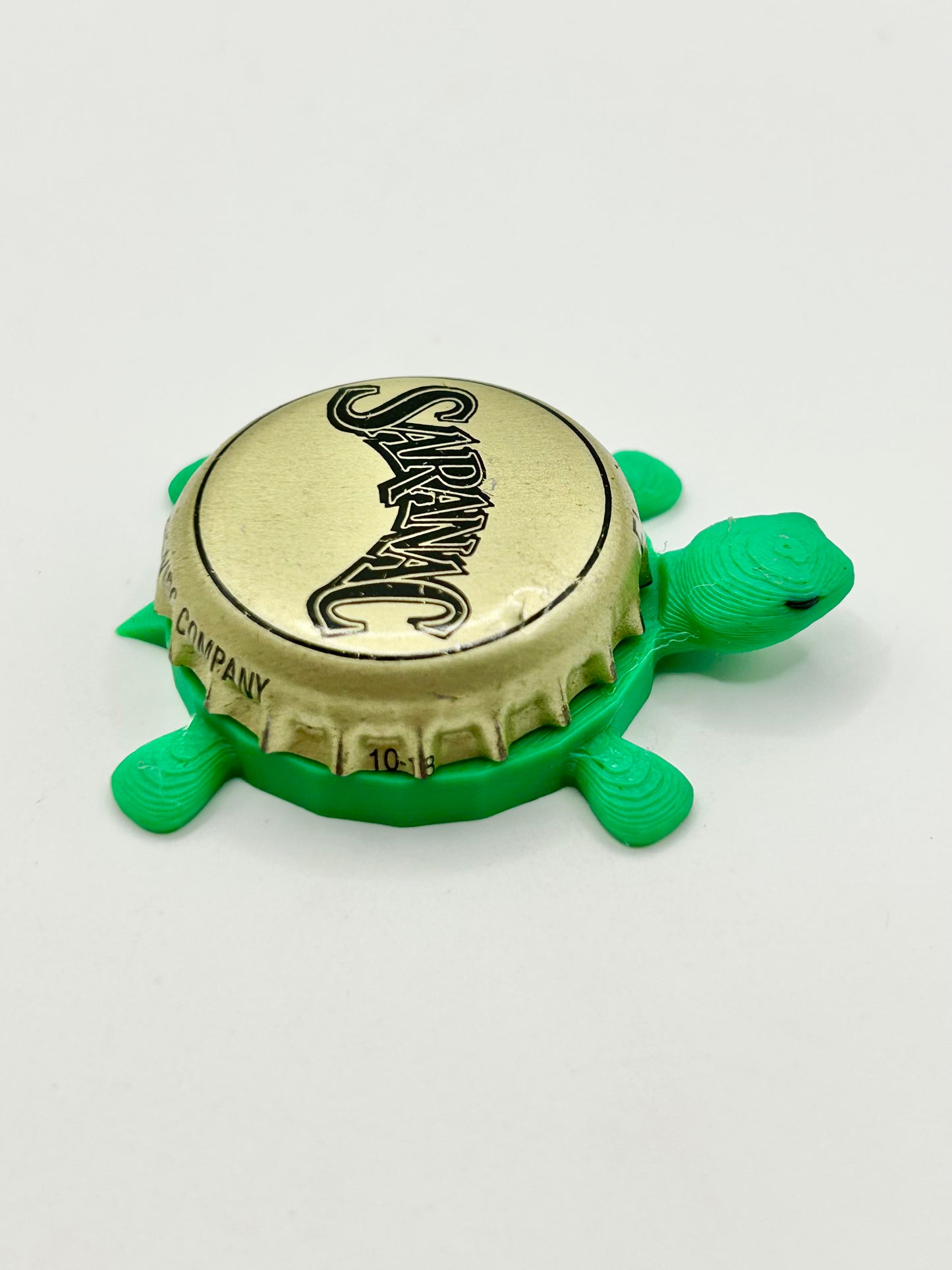 Saranac (Black Text) - Bottle Cap Magnet Turtle