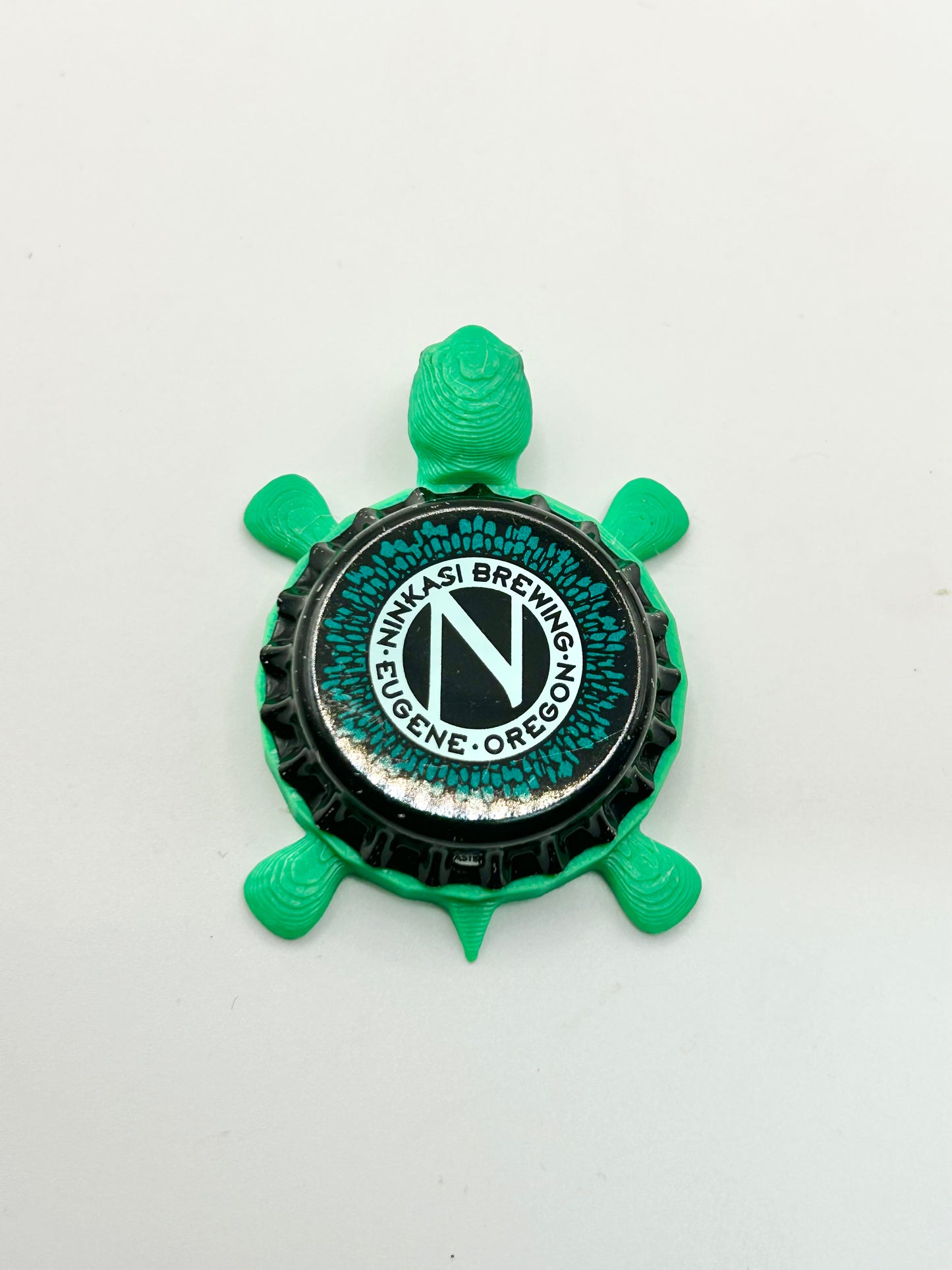 Ninkasi Brewing (Green Border) - Bottle Cap Magnet Turtle