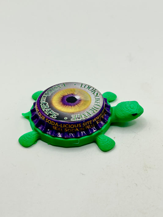 Looks Like Orange, Tastes Like Grape Real Soda - Bottle Cap Magnet Turtle Shell Shocked Art