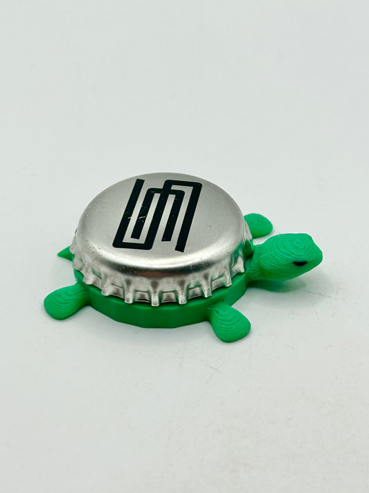 Silver City Brewing - Bottle Cap Magnet Turtle Shell Shocked Art