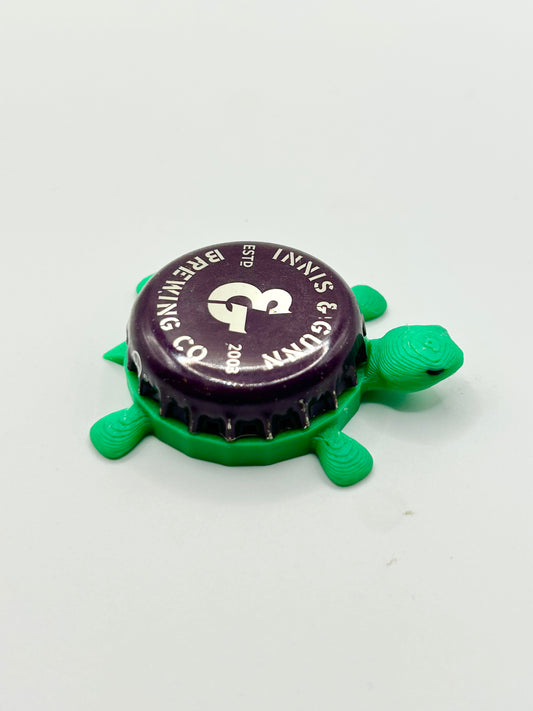 Innis & Gunn Brewing Co (Plum) - Bottle Cap Magnet Turtle