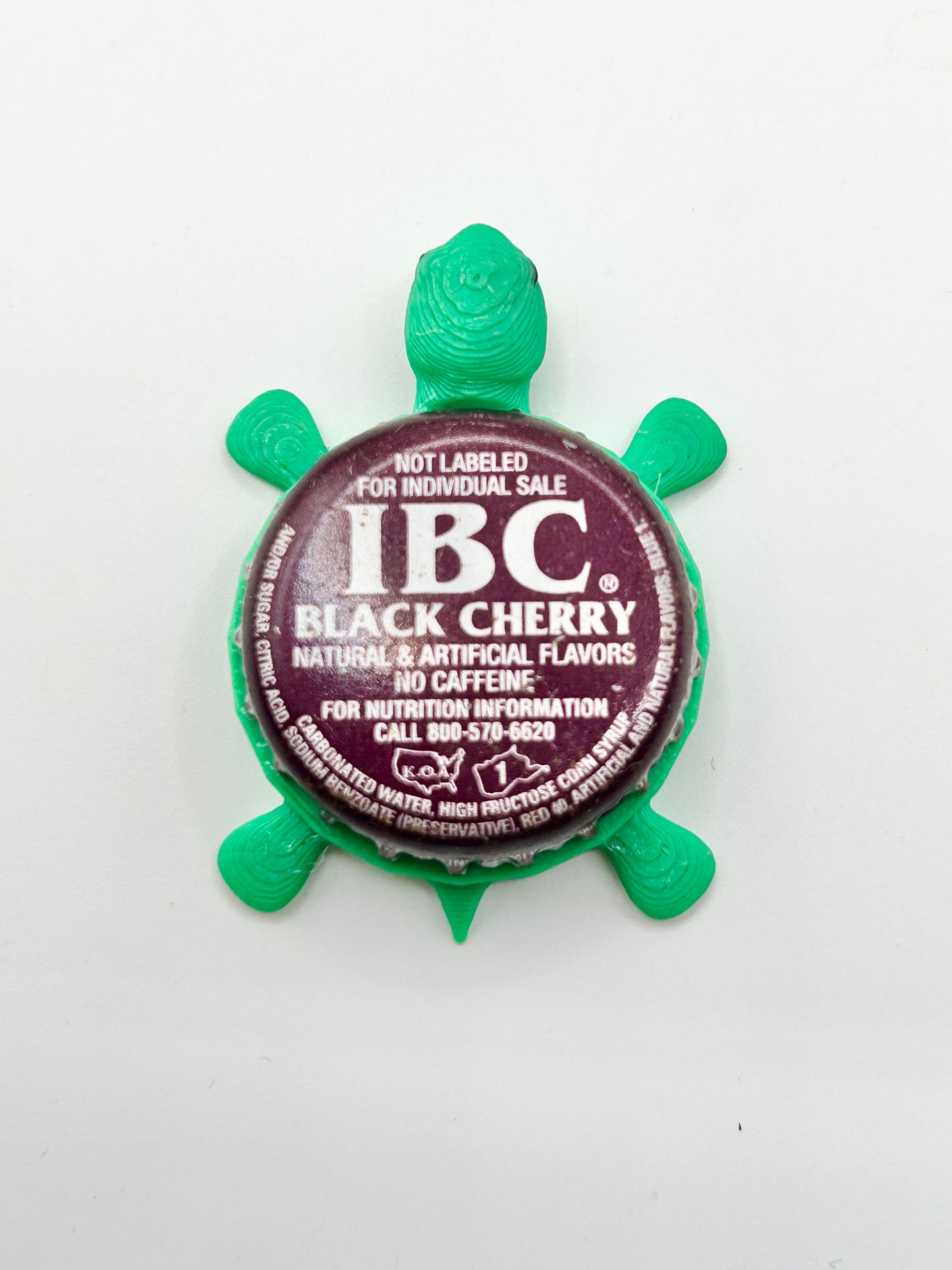 IBC Black Cherry Soda (Older Design) - Bottle Cap Magnet Turtle