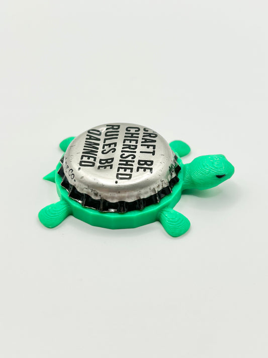 Craft Be Cherished. Rules Be Damned. DuClaw Brewing - Bottle Cap Magnet Turtle