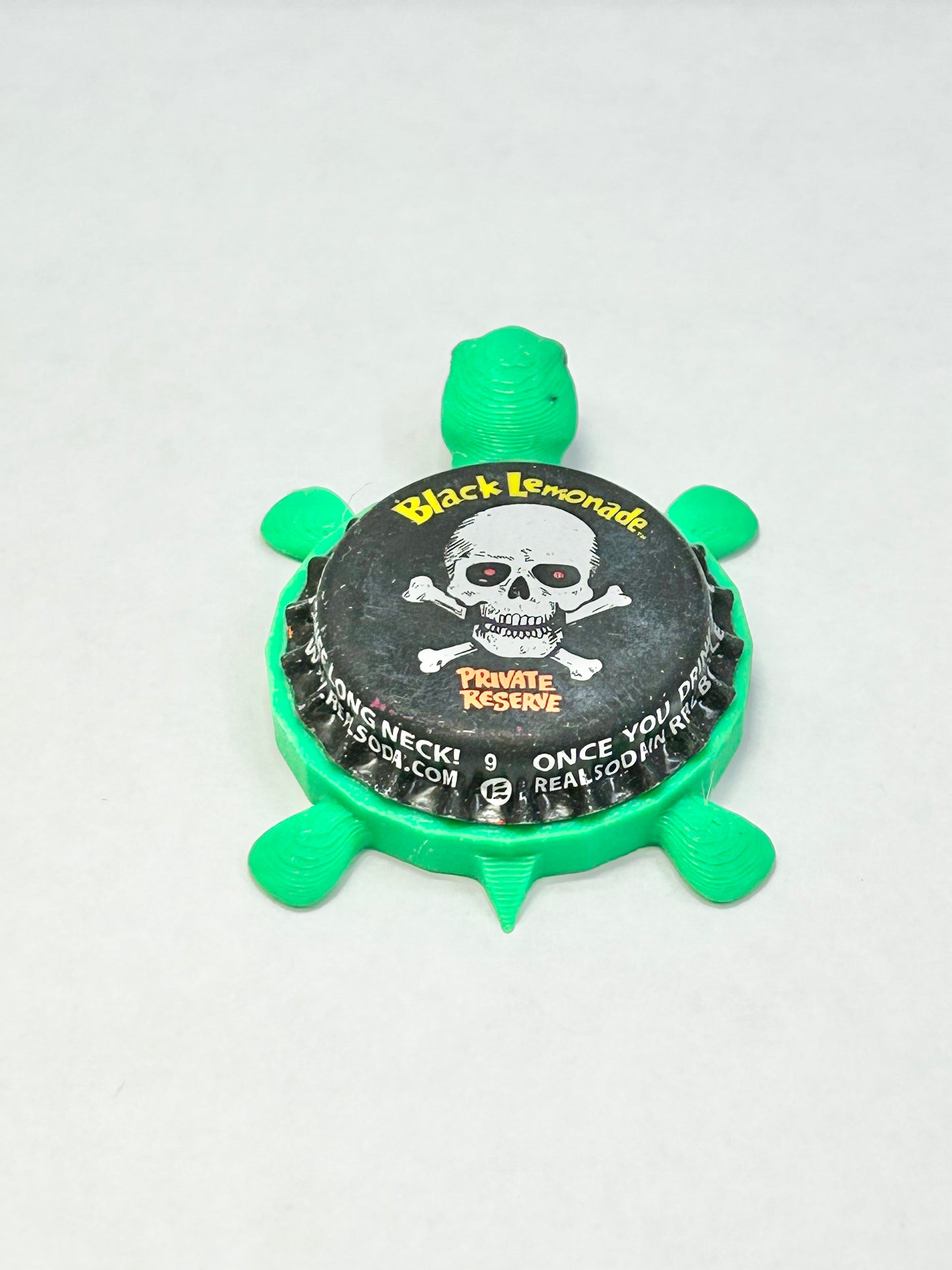 Black Lemonade (Vintage) - Bottle Cap Magnet Turtle