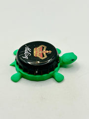 A Le Coq, Tartu (Estonia) - Bottle Cap Magnet Turtle Shell Shocked Art