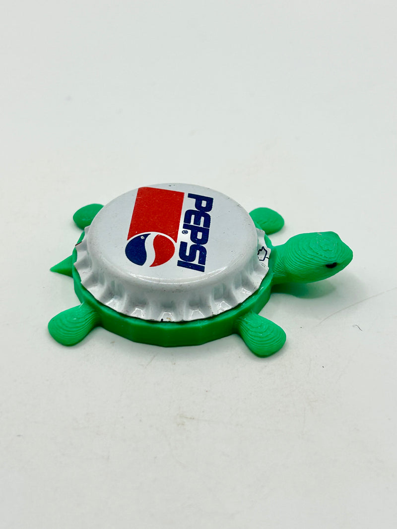 Pepsi (International) - Bottle Cap Magnet Turtle Shell Shocked Art