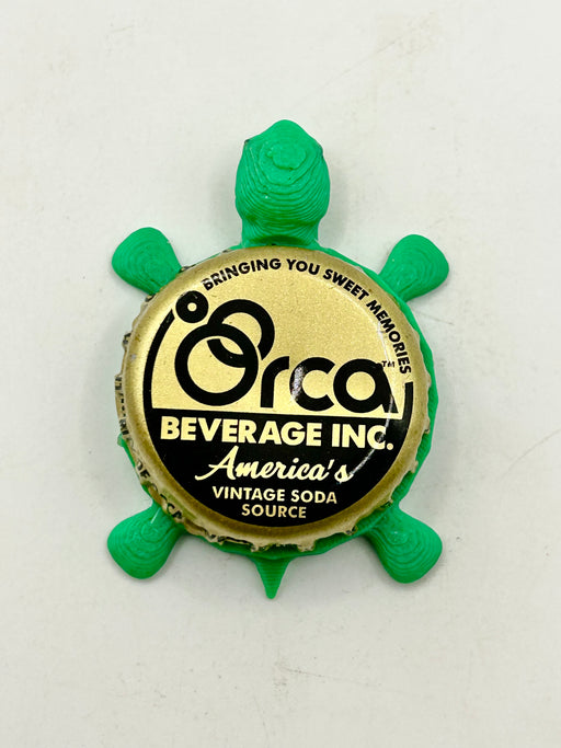 Orca Beverages (Gold) - Bottle Cap Magnet Turtle Shell Shocked Art