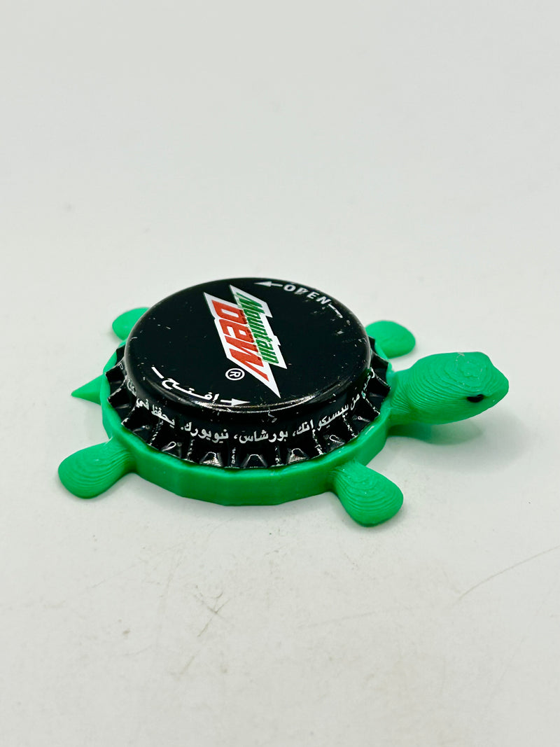 Mountain Dew (International) - Bottle Cap Magnet Turtle Shell Shocked Art