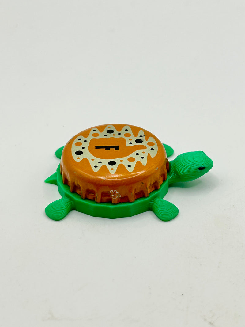 Freddie’s Soda - Bottle Cap Magnet Turtle Shell Shocked Art