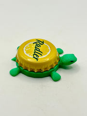 Warka Radler (Poland) - Bottle Cap Magnet Turtle Shell Shocked Art