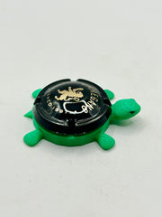 Ommegang (Cork Cage Cap, Black) - Bottle Cap Magnet Turtle Shell Shocked Art