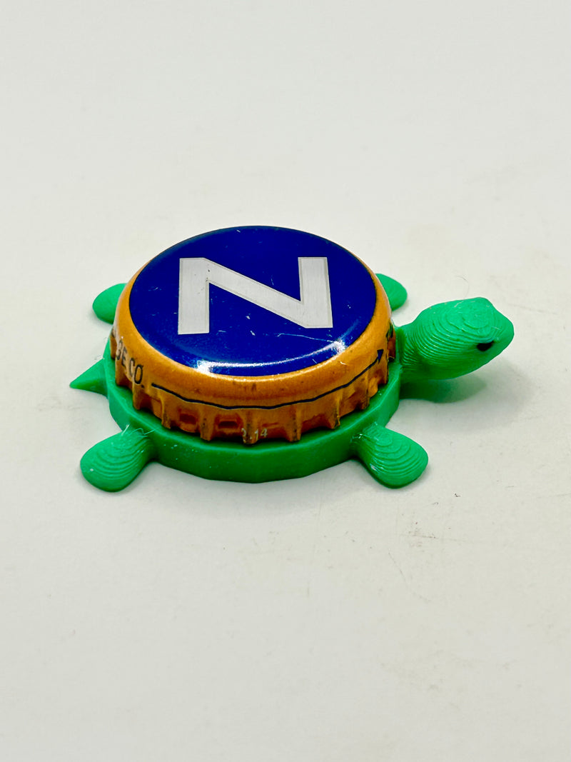Zima (Big Z) - Bottle Cap Magnet Turtle Shell Shocked Art