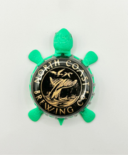 North Coast Brewing Co (Whale Tail Black) - Bottle Cap Magnet Turtle Shell Shocked Art
