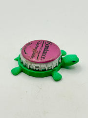 Sundance Cranberry Sparkler - Bottle Cap Magnet Turtle Shell Shocked Art
