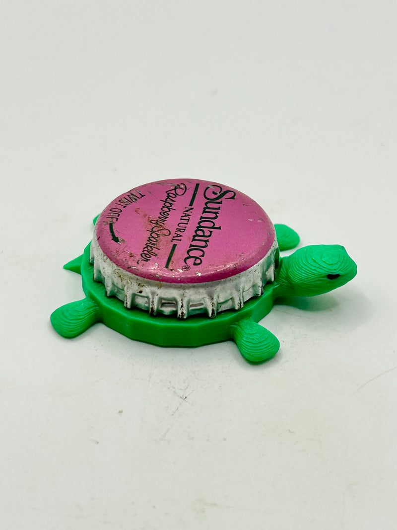 Sundance Cranberry Sparkler - Bottle Cap Magnet Turtle Shell Shocked Art