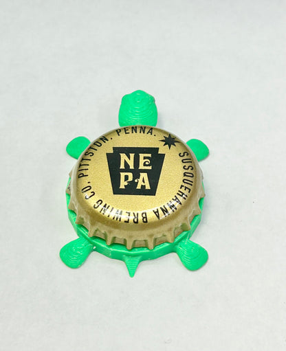 Susquehanna Brewing - Bottle Cap Magnet Turtle Shell Shocked Art