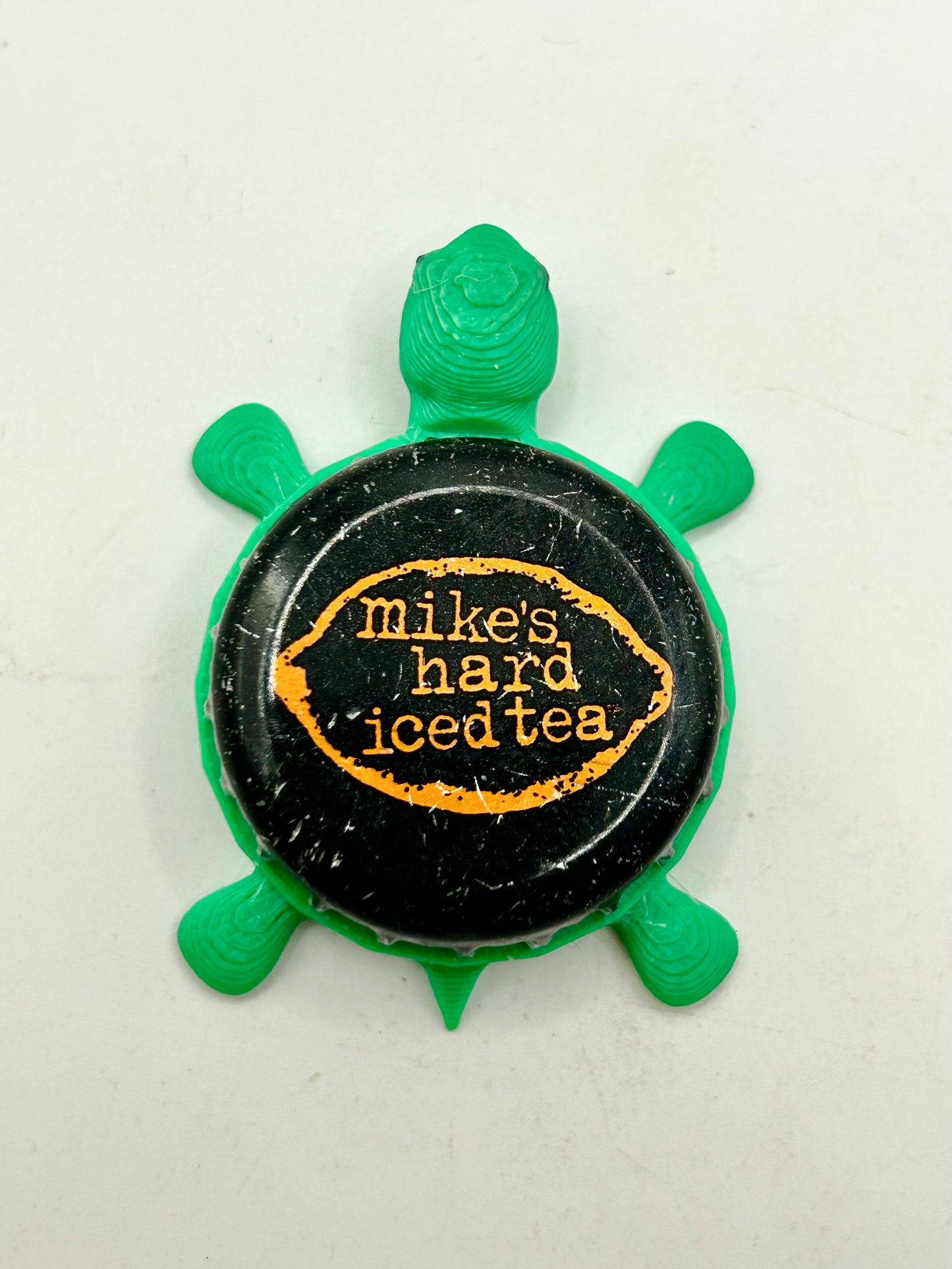Mikes Hard Iced Tea - Bottle Cap Magnet Turtle Shell Shocked Art