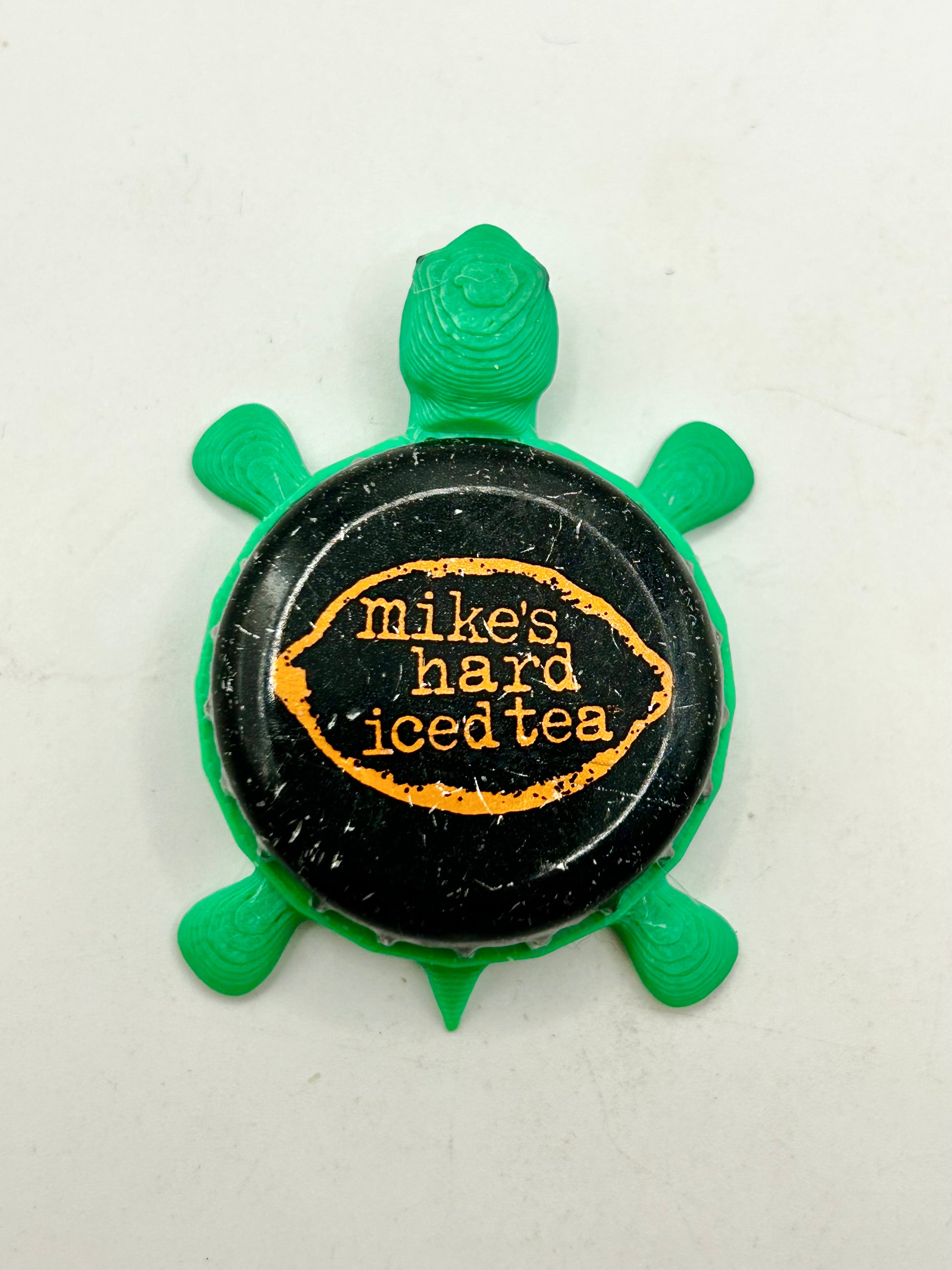 Mikes Hard Iced Tea - Bottle Cap Magnet Turtle Shell Shocked Art