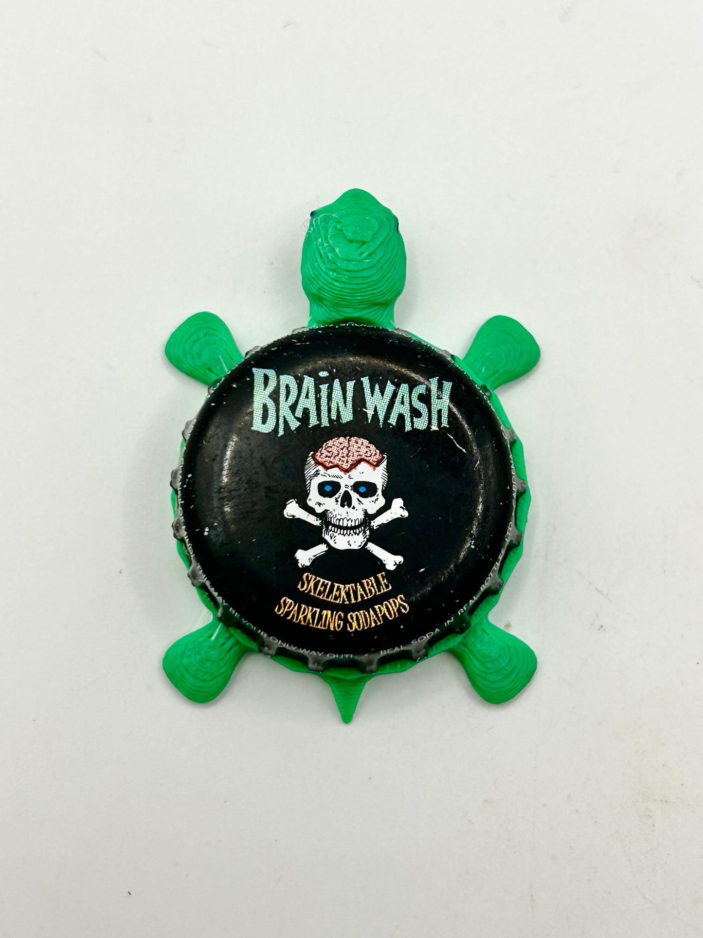 Brain Wash Skelektable Soda - Bottle Cap Magnet Turtle Shell Shocked Art