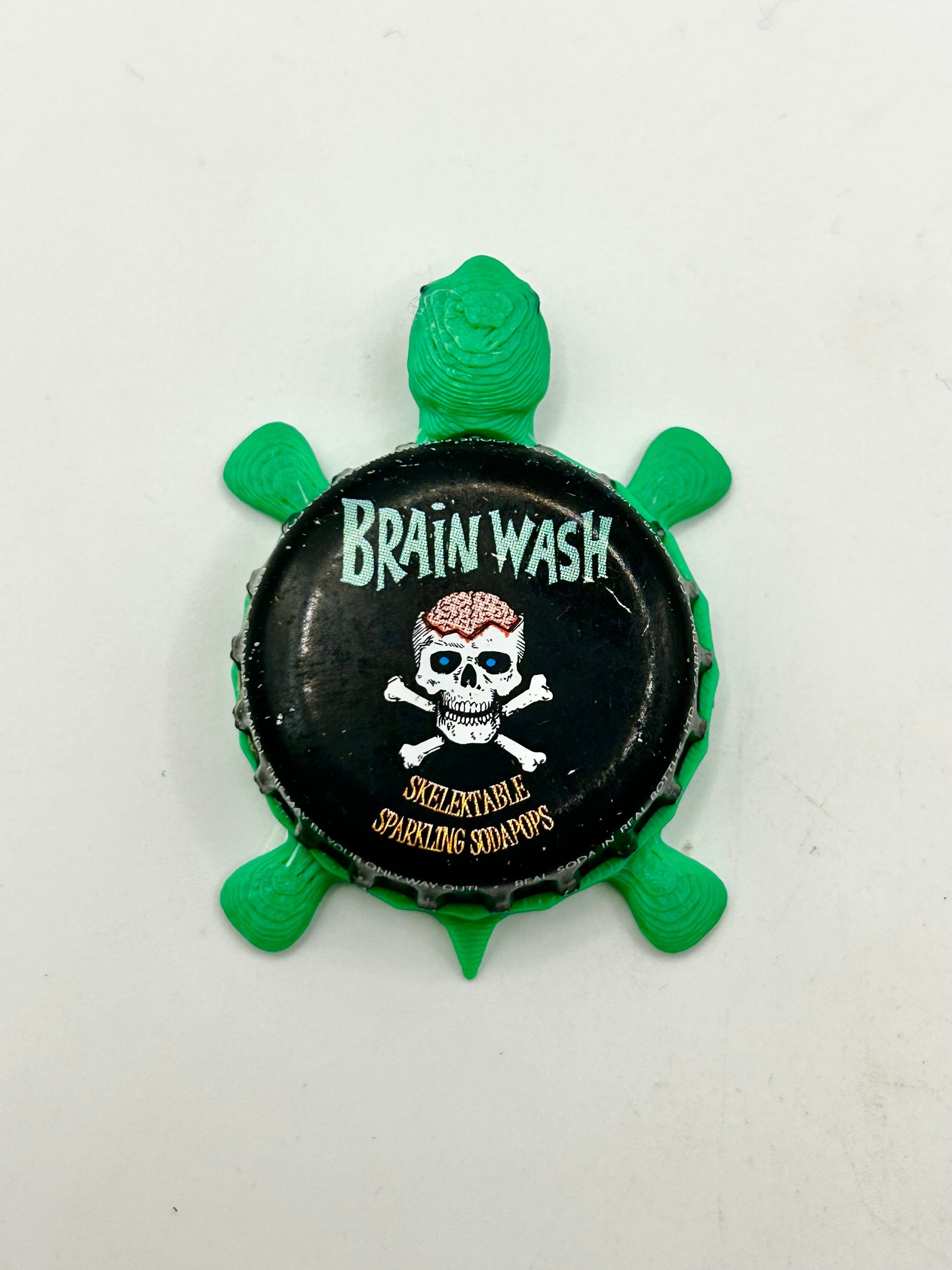 Brain Wash Skelektable Soda - Bottle Cap Magnet Turtle Shell Shocked Art