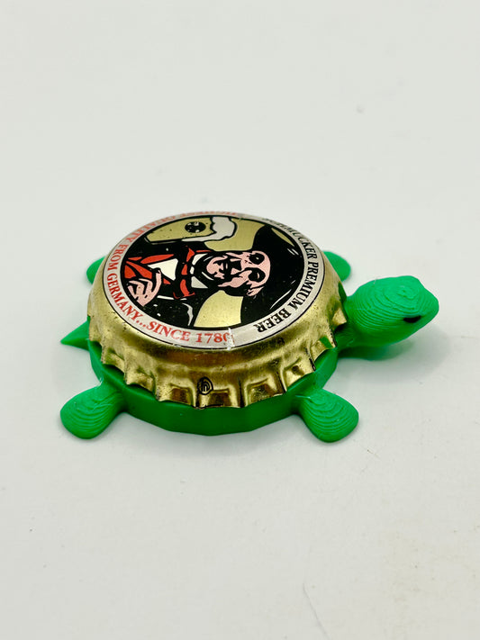 Schmucker Beer - Bottle Cap Magnet Turtle Shell Shocked Art