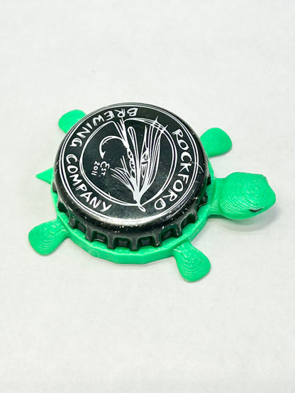 Rockford Brewing Co - Bottle Cap Magnet Turtle Shell Shocked Art