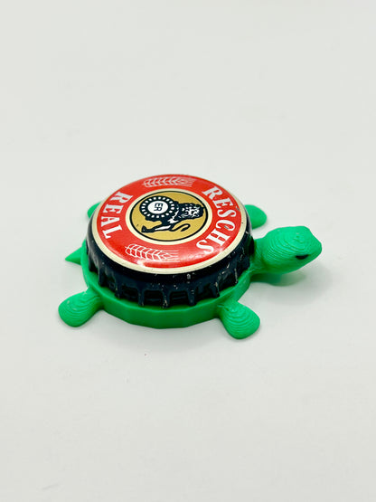 Reschs Real Lager - Bottle Cap Magnet Turtle Shell Shocked Art