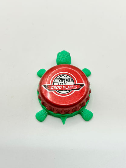 Aero Plains Brewing - Bottle Cap Magnet Turtle Shell Shocked Art
