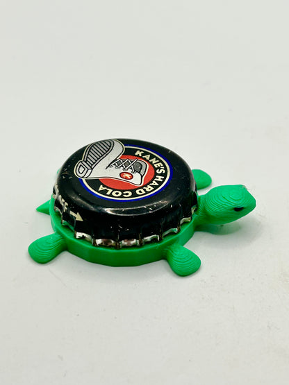 Kane’s Hard Cola - Bottle Cap Magnet Turtle Shell Shocked Art
