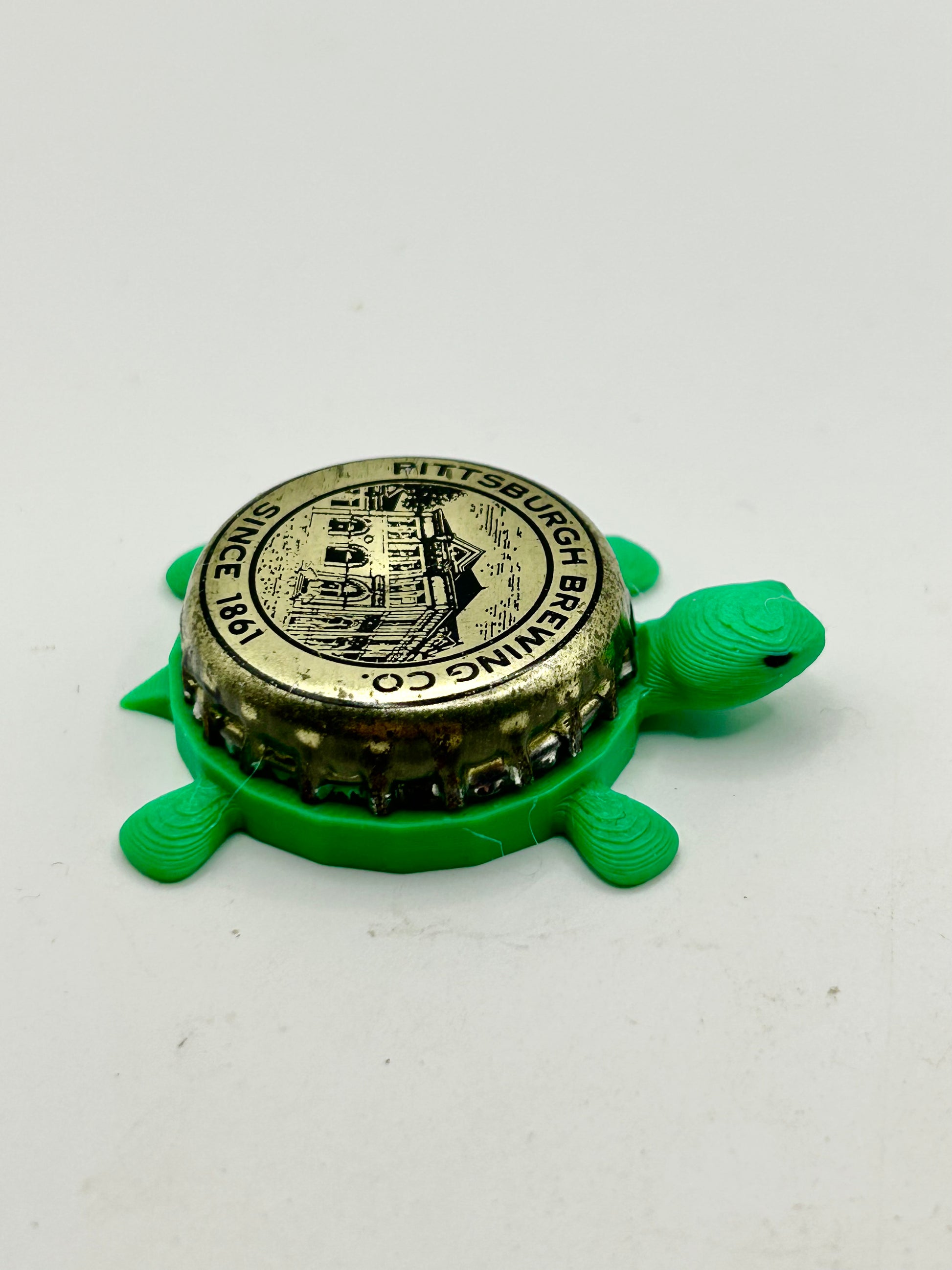 Pittsburgh Brewing - Bottle Cap Magnet Turtle Shell Shocked Art