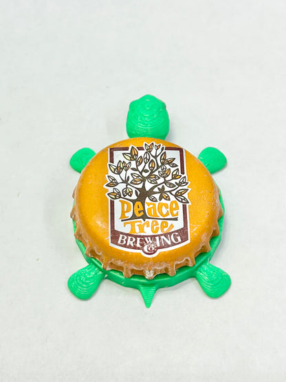 Peace Tree Brewing - Bottle Cap Magnet Turtle Shell Shocked Art