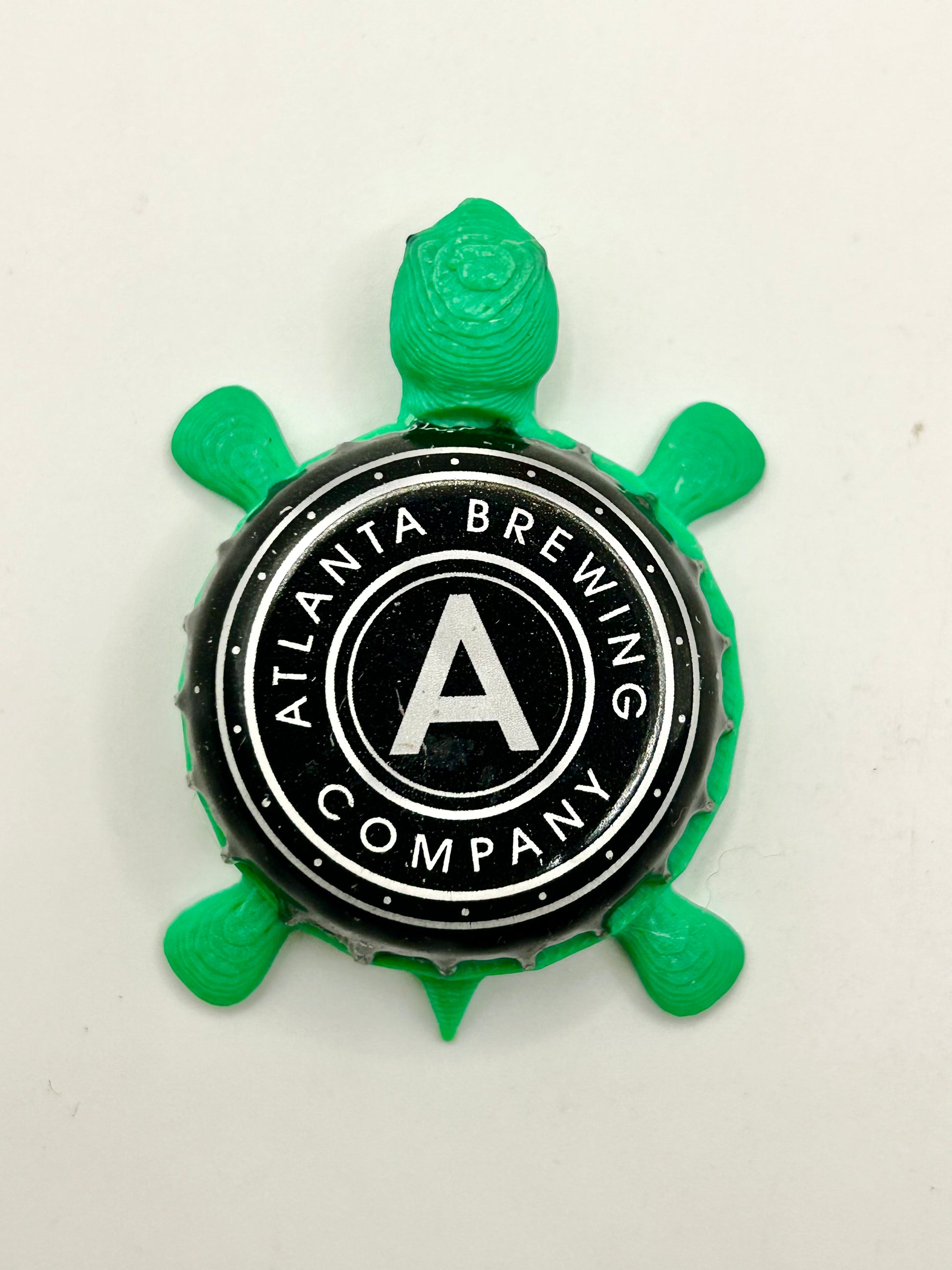 Atlanta Brewing - Bottle Cap Magnet Turtle Shell Shocked Art