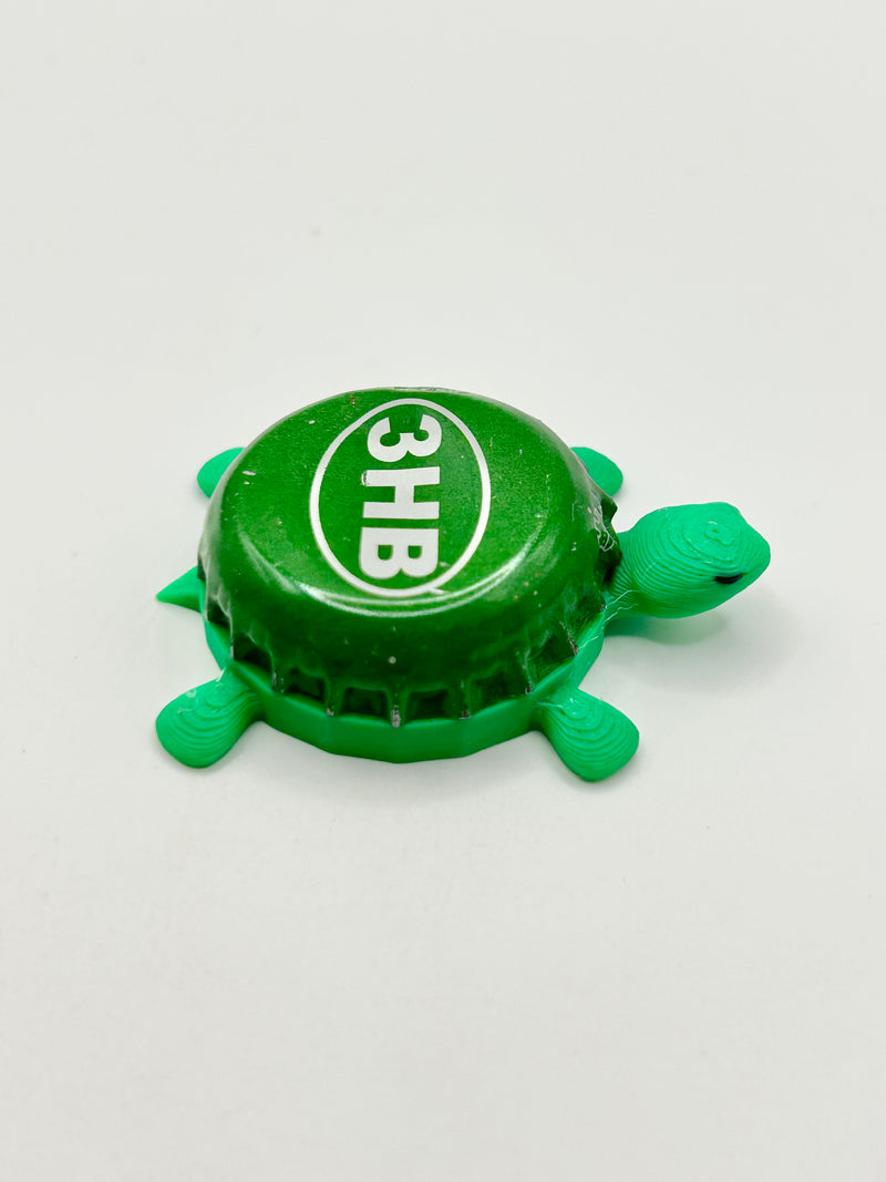 Three Heads Brewing - Bottle Cap Magnet Turtle Shell Shocked Art