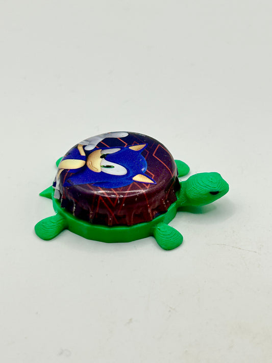 Sonic Pointing - Bottle Cap Magnet Turtle Shell Shocked Art