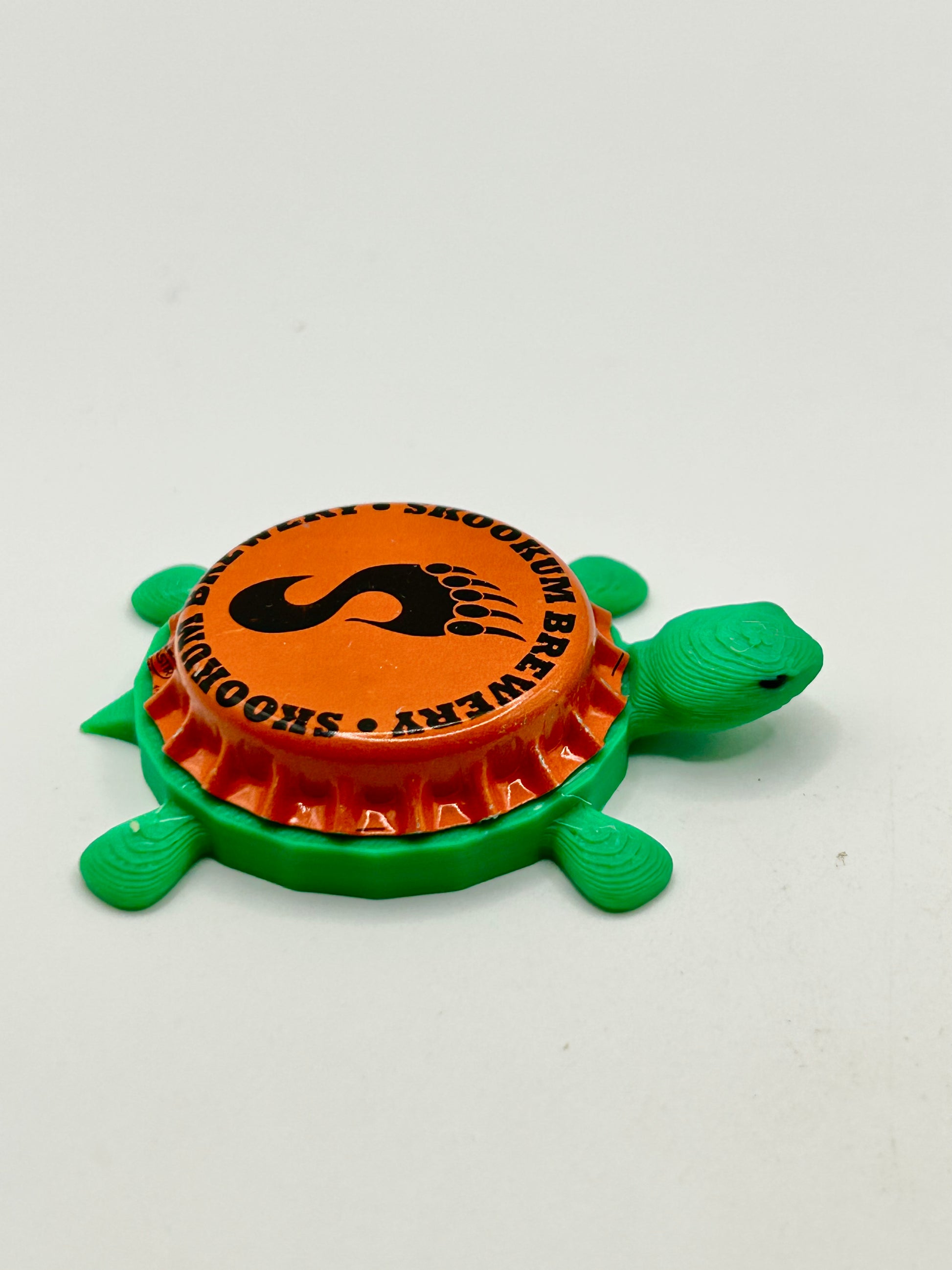Skookum Brewing - Bottle Cap Magnet Turtle Shell Shocked Art