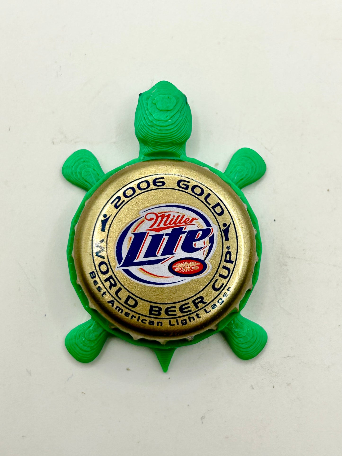 Miller Lite (2006 Gold World Cup) - Bottle Cap Magnet Turtle Shell Shocked Art