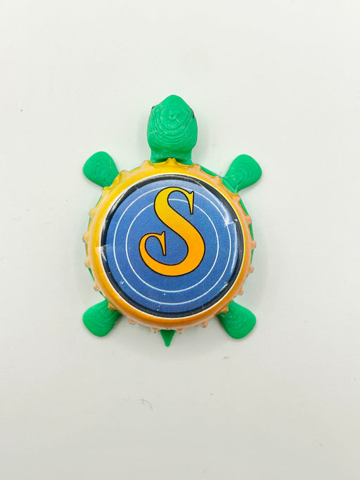 Saugatuck Brewing - Bottle Cap Magnet Turtle Shell Shocked Art
