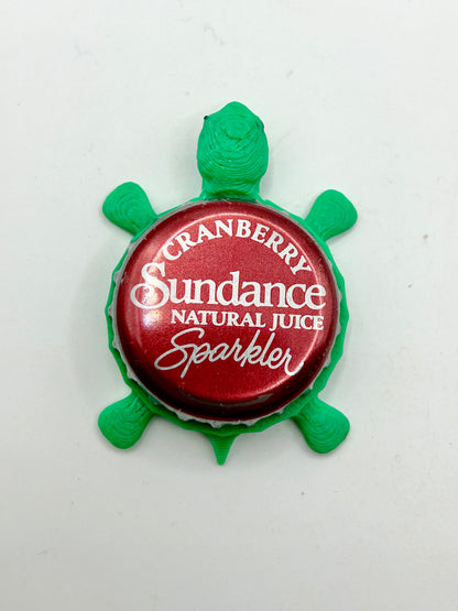 Sundance Cranberry Sparkler - Bottle Cap Magnet Turtle Shell Shocked Art