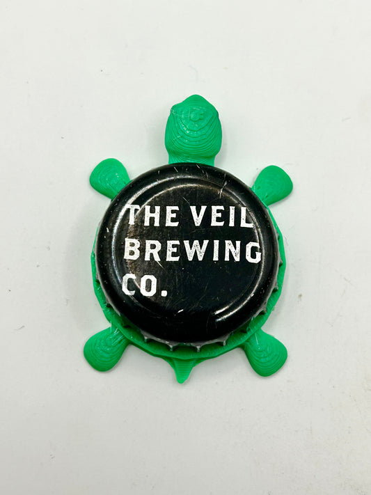 The Veil Brewing - Bottle Cap Magnet Turtle Shell Shocked Art
