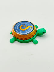 Saugatuck Brewing - Bottle Cap Magnet Turtle Shell Shocked Art