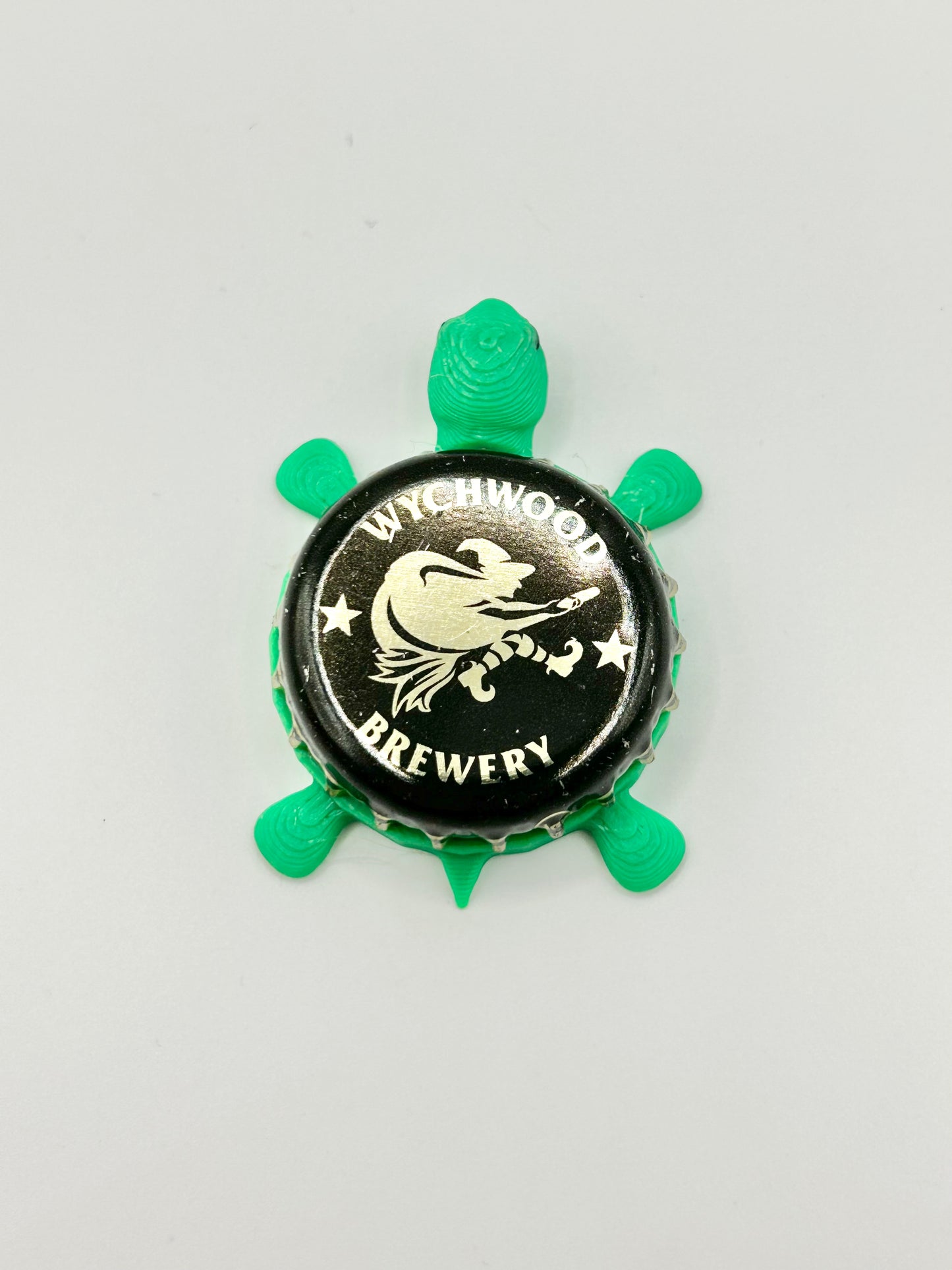Wychwood Brewery (Black) - Bottle Cap Magnet Turtle