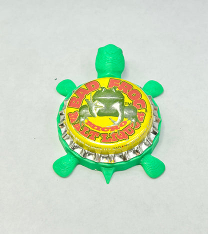Bad Frog Malt Liquor - Bottle Cap Magnet Turtle Shell Shocked Art