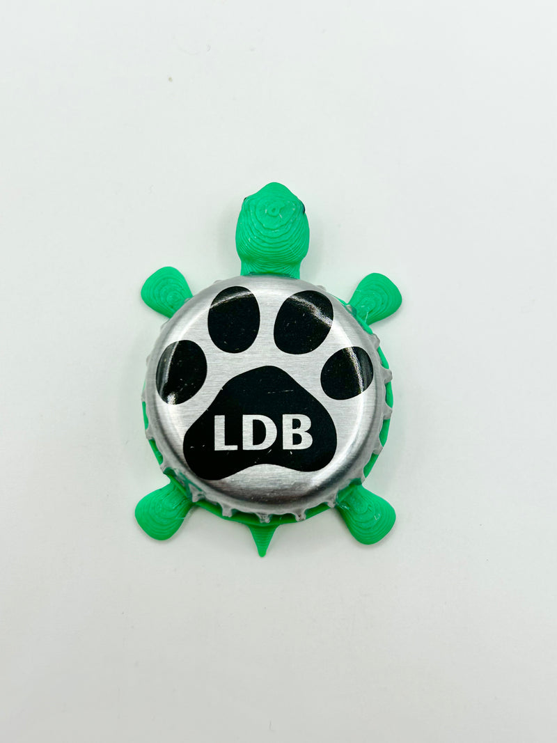Laughing Dog Brewing - Bottle Cap Magnet Turtle Shell Shocked Art