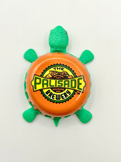 The Palisade Brewery - Bottle Cap Magnet Turtle Shell Shocked Art