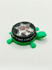 Jackson Hole Soda - Bottle Cap Magnet Turtle Shell Shocked Art