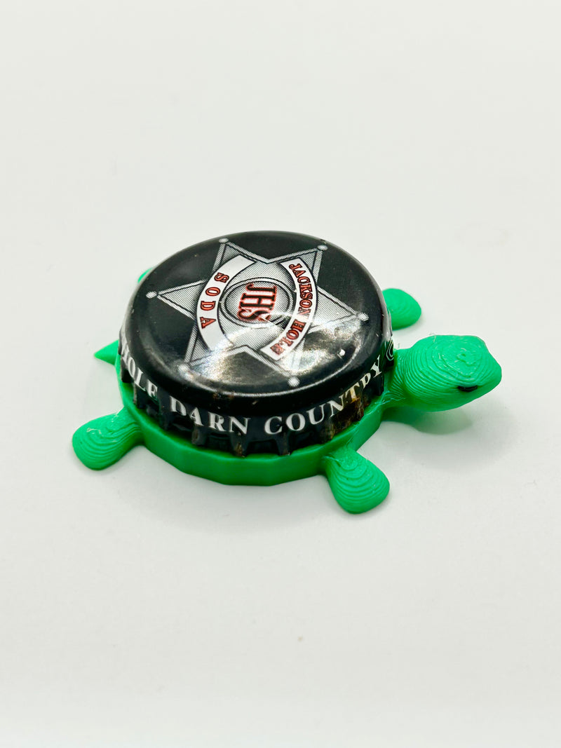 Jackson Hole Soda - Bottle Cap Magnet Turtle Shell Shocked Art
