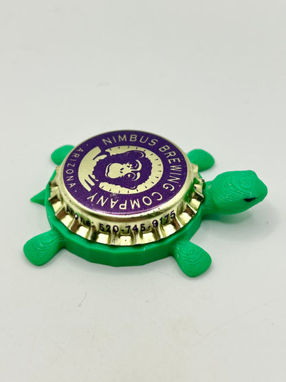 Nimbus Brewing - Bottle Cap Magnet Turtle Shell Shocked Art