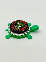 Bad Frog Malt Liquor (Black) - Bottle Cap Magnet Turtle Shell Shocked Art