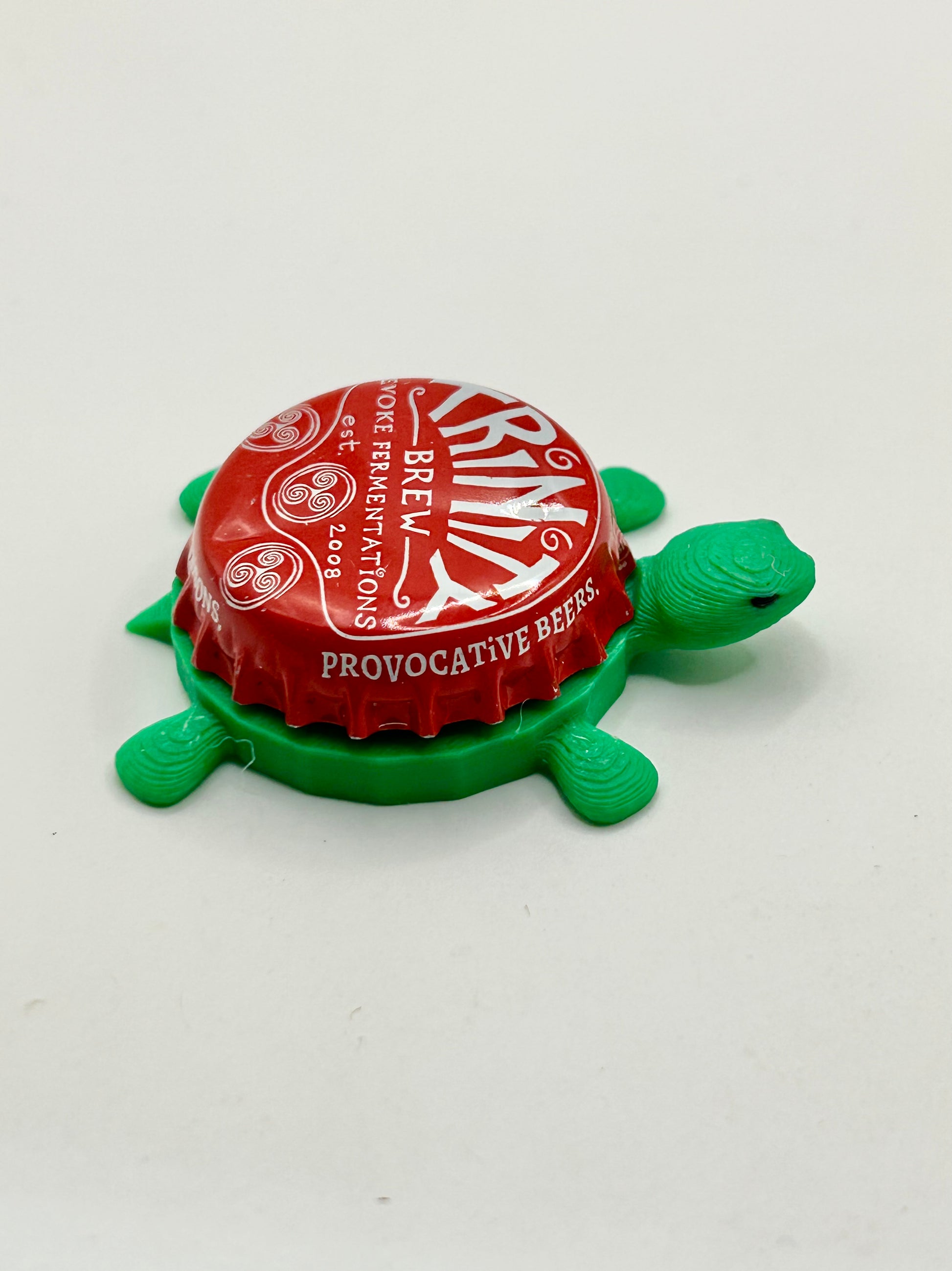 Trinity Brewing - Bottle Cap Magnet Turtle Shell Shocked Art