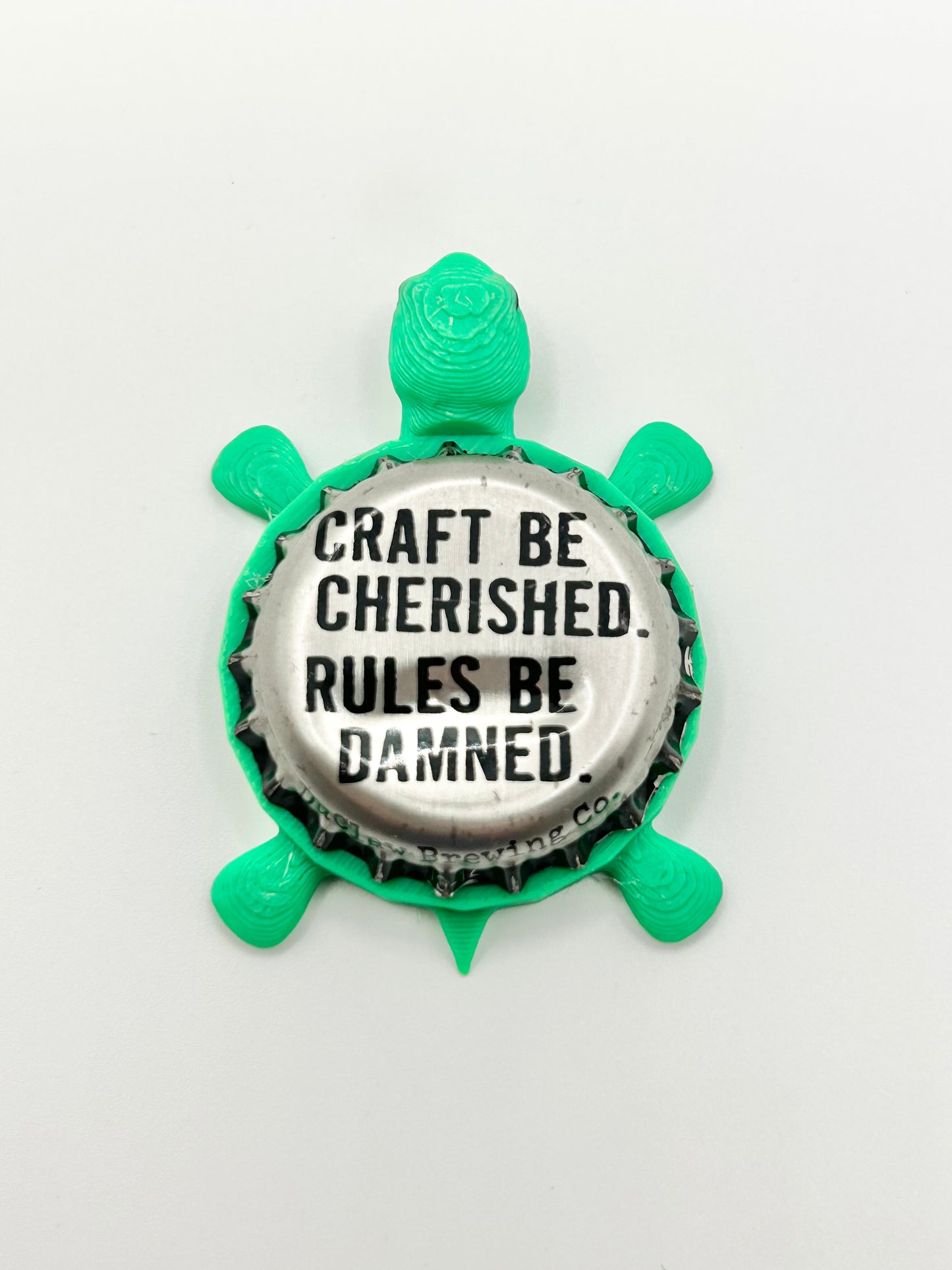 Craft Be Cherished. Rules Be Damned. DuClaw Brewing - Bottle Cap Magnet Turtle